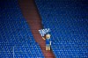 FILE - In this Feb.20, 2021 file photo Schalke mascot Erwin waves a team flag from the stands during the German Bundesliga soccer match between FC Schalke 04 and Borussia Dortmund in Gelsenkirchen, Germany. (AP Photo/Martin Meissner, file)