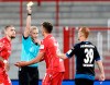 Referee Bibiana Steinhaus shows Berlin's Grischa Praemel (2nd from right) the yellow card. during a German Bundesliga soccer match between Union Berlin and SC Paderborn in Berlin, Germany, Tuesday, June 16, 2020. (Kay Nietfeld/Pool via AP)