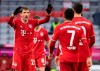 Munich's Thomas Mueller celebrates his side's second goal during a German Bundesliga soccer match between Bayern Munich and TSG Hoffenheim in Munich, Germany, Saturday, Jan.30, 2021. (Sven Hoppe/dpa via AP)