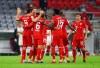 Bayern Munich's Robert Lewandowski celebrates scoring their second goal with teammates during the German soccer cup semi-final match between Bayern Munich and Eintracht Frankfurt in Munich, Germany, Wednesday, June 10, 2020. (Kai Pfaffenbach/Pool via AP)