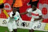 Stuttgart's Silas Wamangituka, left, and Stuttgart's Orel Mangala celebrate during the German Bundesliga soccer match between Borussia Dortmund and VfB Stuttgart in Dortmund, Germany, Saturday, Dec.12, 2020. (Focke Strangmann/Pool via AP)