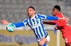 Hertha's Matheus Cunha, left, and Leverkusen's Jeremie Frimpong fight for the ball during a German Bundesliga soccer match between Hertha BSC Berlin and Bayer Leverkusen in Berlin, Germany, Sunday, March 21, 2021. (Soeren Stache/Pool via AP)