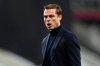 Fulham's manager Scott Parker watches his players warm up before an English Premier League soccer match between Newcastle United and Fulham at the St. James' Park stadium in Newcastle, England, Saturday Dec. 19, 2020. (Stu Forster/Pool via AP)