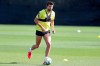 In this photo provided by FC Barcelona, Barcelona's Gerard Pique runs with the ball during a training session in Barcelona, Spain on Friday May 8, 2020. Soccer players in Spain returned to train for the first time since the country entered a lockdown nearly two months ago because of the coronavirus pandemic. (Miguel Ruiz/FC Barcelona via AP)