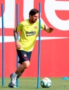 In this photo provided by FC Barcelona, Barcelona's Lionel Messi trains in Barcelona, Spain, on Friday May 8, 2020. Soccer players in Spain returned to train for the first time since the country entered a lockdown nearly two months ago because of the coronavirus pandemic. (Miguel Ruiz/FC Barcelona via AP)
