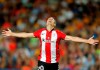 FILE - In this Aug. 17, 2015 file photo, Athletic Bilbao's Aritz Aduriz celebrates after scoring against FC Barcelona during a Spanish Super Cup soccer match at the Camp Nou stadium in Barcelona, Spain. Aduriz announced his retirement from soccer on Wednesday May 20, 2020 a day after finding out he needs a hip replacement that will keep him from continuing to perform as an athlete. (AP Photo/Manu Fernandez, File)