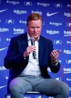 Ronald Koeman speaks during his official presentation as coach for FC Barcelona in Barcelona, Spain, Wednesday, Aug. 19, 2020. Barcelona officially announced earlier on Wednesday a deal with Koeman to become their coach five days after the team's humiliating 8-2 loss to Bayern Munich in the Champions League quarterfinals. Barcelona says the former defender's deal runs through June 2022. Koeman replaces the fired Quique Setien. (AP Photo/Joan Monfort)