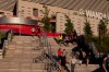 People walk on the steps of the Wanda Metropolitano stadium in Madrid, Spain, Tuesday, May 5, 2020. The Spanish soccer league aims to restart in June without spectators. It's new compulsory protocols say all players, coaches and club employees must be tested for COVID-19 coronavirus before training resumes, then regularly after that. All clubs' training facilities must be properly prepared and disinfected before players can start practising individually. (AP Photo/Paul White)
