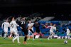 Aston Villa's Anwar El Ghazi, 3rd from left, scores the opening goal during an English Premier League soccer match between Leeds United and Aston Villa at the Elland Road Stadium in Leeds, England, Saturday Feb. 27, 2021. (Laurence Griffiths/Pool via AP)