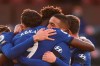 Chelsea players celebrate with Hakim Ziyech, centre right, after he scored his side's opening goal during an English Premier League soccer match between Burnley and Chelsea at the Turf Moor stadium in Burnley, England, Saturday Oct. 31, 2020. (Oli Scarff/Pool via AP)