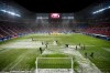 Workers clear snow from the pitch before the start of a Spanish La Liga soccer match between Osasuna and Real Madrid at El Sadar stadium in Pamplona, Spain, Saturday, Jan. 9, 2021. (AP Photo/Alvaro Barrientos)