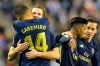 Real Madrid's Nacho, 2nd left, celebrates with Casemiro after scoring his side's opening goal during a Spanish La Liga soccer match between Valladolid and Real Madrid at the Jose Zorrilla stadium in Valladolid, Spain, Sunday Jan. 26, 2020. (AP Photo/Ricardo Ordonez)