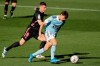 Celta Vigo's Denis Suarez is chased by Real Madrid's Toni Kroos during a Spanish La Liga soccer match between Celta and Real Madrid at the Balaidos stadium in Vigo, Spain, Saturday March 20, 2021. (AP Photo/Lalo R.Villar)