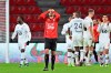 Rennes' Clement Grenier, 2nd left, reacts at the end of a French League One Soccer match between Rennes and Lille at the Roazhon Park stadium in Rennes, France, Sunday Jan. 24, 2021. (AP Photo/David Vincent)
