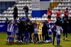 Alcoyano players celebrate after knocking out Real Madrid during a Spanish Copa del Rey round of 32 soccer match between Alcoyano and Real Madrid at the El Collao stadium in Alcoy, Spain, Wednesday Jan. 20, 2021. (AP Photo/Jose Breton)