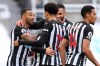 Newcastle's Callum Wilson, left celebrates with team mates after scoring his side's second goal during an English Premier League soccer match between Newcastle United and Everton at the St. James' Park stadium in Newcastle, England, Sunday Nov. 1, 2020.(Alex Pantling/Pool via AP)