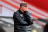 Sheffield United's manager Chris Wilder covers his face during an English Premier League soccer match between Sheffield United and Southampton at the Bramall Lane stadium in Sheffield, England, Saturday March 6, 2021. (Mike Egerton/Pool via AP)