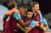 West Ham's Issa Diop, 2nd left celebrates with team mates after scoring his side's second goal during an English Premier League soccer match between West Ham and Sheffield United at the London stadium in London, England, Monday Feb. 15, 2021. (Glyn Kirk/Pool via AP)