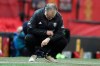 Leeds United's head coach Marcelo Bielsa looks at his watch during an English Premier League soccer match between Manchester United and Leeds United at the Old Trafford stadium in Manchester, England, Sunday Dec. 20, 2020. (Nick Potts/Pool via AP)