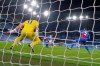 Manchester City's John Stones, centre, scores his side's third goal during an English Premier League soccer match between Manchester City and Crystal Palace at the Etihad Stadium in Manchester, England, Sunday Jan.17, 2021. (Peter Powell/Pool via AP)