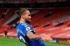 Everton's Dominic Calvert-Lewin celebrates after scoring his side's third goal during an English Premier League soccer match between Manchester United and Everton at the Old Trafford stadium in Manchester, England, Saturday Feb. 6, 2021. (Michael Regan/Pool via AP)
