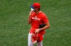 Philadelphia Phillies' Aaron Nola adjusts his mask during baseball practice at Citizens Bank Park, Monday, July 6, 2020, in Philadelphia. (AP Photo/Matt Slocum)