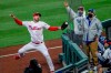 Philadelphia Phillies right fielder Matt Joyce, left, catches a fly ball from New York Mets' James McCann during the second inning of a baseball game, Friday, April 30, 2021, in Philadelphia. (AP Photo/Laurence Kesterson)