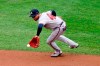 Atlanta Braves second baseman Johan Camargo catches a fielder's choice by Philadelphia Phillies' Adam Haseley during the second inning of a baseball game, Saturday, Aug. 29, 2020, in Philadelphia. Andrew Knapp was forced out at second on the play and Haseley was safe at first. (AP Photo/Matt Slocum)