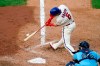 Philadelphia Phillies' Andrew Knapp hits a two-run triple off Toronto Blue Jays pitcher Thomas Hatch during the first inning of the fifth baseball game in a doubleheader, Friday, Sept. 18, 2020, in Philadelphia. (AP Photo/Matt Slocum)