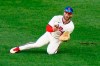 Philadelphia Phillies right fielder Bryce Harper catches a line out by Toronto Blue Jays' Alejandro Kirk during the sixth inning of the first baseball game in a doubleheader, Friday, Sept. 18, 2020, in Philadelphia. (AP Photo/Matt Slocum)