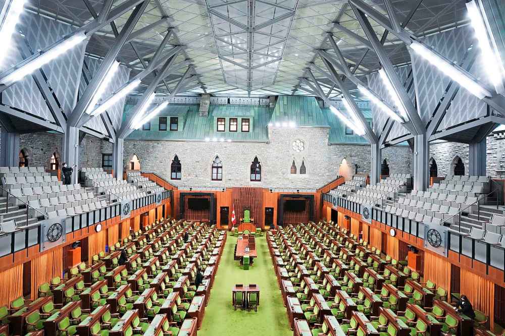 CP
Pages makes preparations in The House of Commons on Parliament Hill in Ottawa on Friday. The 44th Session of Parliament started in the House of Commons on Monday. THE CANADIAN PRESS/Sean Kilpatrick