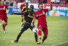 Columbus Crew SC Mohammed Saeid gets tangled up with Toronto FC Mo Babouli second half MLS soccer action in Toronto Saturday May 21, 2016. Discarded by Toronto FC and left in limbo after a contract dispute with a club in Syria, Babouli turned to indoor soccer. But the 27-year-old forward has found a new home with Forge FC of the Canadian Premier League. Babouli and the rest of the Canadian pro league head east Saturday to kick off their pandemic-delayed season.THE CANADIAN PRESS/Aaron Vincent Elkaim