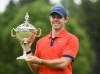 Rory McIlroy of Northern Ireland hoists the Championship trophy after winning the 2019 Canadian Open golf championship in Ancaster, Ont., on Sunday, June 9, 2019. The PGA Tour announced today that the RBC Canadian Open won't be contested this year, as the Tour has been forced to drastically alter its schedule because of the novel coronavirus.THE CANADIAN PRESS/Nathan Denette