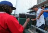 Buffalo Bisons third baseman Vladimir Guerrero Jr. signs a autograph before a minor league baseball against the Lehigh Valley IronPigs in Buffalo, N.Y., Tuesday, July 31, 2018. The Toronto Blue Jays will play most of their home games at their triple-A affiliate's stadium in Buffalo this season, a source tells The Canadian Press. THE CANADIAN PRESS/AP/Jeffrey T. Barnes