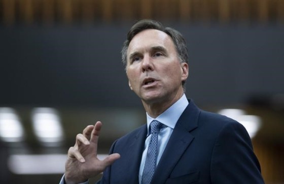 Finance Minister Bill Morneau rises in the House of Commons after delivering deliver a fiscal snapshot, Wednesday, July 8, 2020 in Ottawa. Morneau will outline today how the federal government is reshaping its emergency wage subsidy program that has been extended to the end of the year. He has scheduled a news conference this afternoon at a restaurant in Toronto to make the announcement Prime Minister Justin Trudeau teased Thursday.THE CANADIAN PRESS/Adrian Wyld