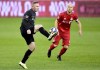 D.C. United forward Wayne Rooney (9) brings the ball down as Toronto FC midfielder Michael Bradley (4) looks on during first half MLS playoff soccer action in Toronto on Saturday, Oct. 19, 2019. The season suspended because of COVID-19, Major League Soccer has extended its team training moratorium through April 3. THE CANADIAN PRESS/Frank Gunn