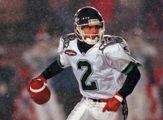 Toronto Argonauts quarterback Doug Flutie scrambles with the ball during first half action against the Edmonton Eskimos at the Grey Cup in Hamilton, Ont., on November 24, 1996. Former CFL star Flutie isn't the least bit surprised to see star quarterbacks Tom Brady and Drew Brees still going strong. THE CANADIAN PRESS/Frank Gunn