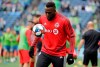 Toronto FC's Jozy Altidore warms up before the MLS Cup championship soccer match against the Seattle Sounders, Sunday, Nov. 10, 2019, in Seattle. Altidore is taking part in a different type of friendly on Monday.The Toronto FC striker is joining forces with Toronto Ultra pro gamer Cameron (Cammy) McKilligan, 