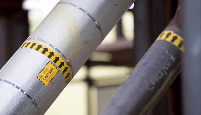 Pipes are shown at a natural gas plant near Fort St. John, B.C., on October 11, 2018. A report funded by the Canadian liquefied natural gas industry estimates that creating a 56-million-tonnes-per-annum LNG industry would result in nearly 100,000 jobs and increase the country's gross domestic product by $11 billion per year. THE CANADIAN PRESS Jonathan Hayward