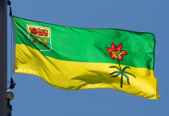 Saskatchewan's provincial flag flies on a flag pole in Ottawa, Monday July 6, 2020. An association of doctors in Saskatchewan is urging the provincial government to apply more caution when it comes to reopening schools.THE CANADIAN PRESS/Adrian Wyld