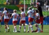 Coach John Tait taps captain Jen Kish on the head after Canada defeated Japan in women's sevens rugby action at the 2016 Olympic Games in Rio de Janeiro, Brazil on Saturday, Aug. 6, 2016. Hours after the IOC pushed back the Tokyo Olympics to 2021, Canadian women's rugby sevens coach John Tait scheduled a conference call with his players. Topics include what's next — and whether the players are willing to keep sacrificing for the cause. Some had already considered retirement after the Tokyo Games, originally slated for July. THE CANADIAN PRESS/Sean Kilpatrick
