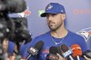 Toronto Blue Jays infielder Travis Shaw talks with reporters at the team's spring training facility in Dunedin, Fla., Sunday, Feb. 16, 2020. As the Blue Jays wait for word on whether they'll be able to play in Toronto after training camp, infielder Shaw voiced his concern Friday about the length of time players may need to stay in their closed environment at Rogers Centre and its adjoining hotel.THE CANADIAN PRESS/Steve Nesius