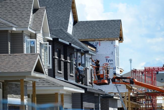 A new home is built in a housing development in Ottawa on Tuesday, July 14, 2020. Federal officials are ironing out details of a planned program to help cities buy properties left vacant due to the pandemic so they can quickly create affordable housing units, which mayors say is desperately needed. THE CANADIAN PRESS/Sean Kilpatrick