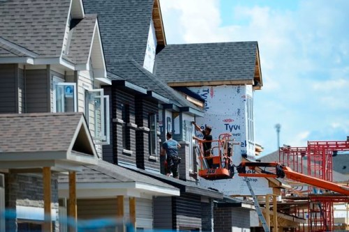 A new home is built in a housing development in Ottawa on Tuesday, July 14, 2020. Federal officials are ironing out details of a planned program to help cities buy properties left vacant due to the pandemic so they can quickly create affordable housing units, which mayors say is desperately needed. THE CANADIAN PRESS/Sean Kilpatrick