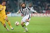 FILE - In this Dec. 9, 2014 file photo, Juventus' Andrea Pirlo, right, challenges the ball with Atletico' Mario Mandzukic during a Champions League, Group A, soccer match between Juventus and Atletico de Madrid at the Juventus stadium in Turin, Italy. New Juventus coach Andrea Pirlo had his coaching qualification rubber-stamped by the Italian soccer federation on Wednesday, Sept. 16, 2020. (AP Photo/Massimo Pinca, file)