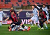 Bologna's Riccardo Orsolini competes for the ball with FC Internazionale Milano's Nicolo Barella during the Italian Serie A soccer match between Bologna and Inter Milan at the Renato Dall'Ara stadium in Bologna, Italy, Saturday, April 3, 2021. (Massimo Paolone/LaPresse via AP)AP)