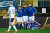 Italy's Domenico Berardi, second right, celebrates after scoring the first goal during the World Cup 2022 qualifier group c soccer game between Italy and Northern Ireland at the Stadio Ennio Tardini in Parma, Italy, Thursday, March 25, 2021. (Massimo Paolone/LaPresse via AP)