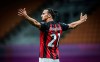 Milan's Zlatan Ibrahimovic celebrates after scoring the second goal during a Serie A soccer match between Milan and Cagliari, at the Giuseppe Meazza stadium in Milan, Italy, Saturday, Aug. 1, 2020. (Spada/LaPresse via AP)