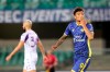 Hellas Verona's Eddie Salcedo, right, celebrates scoring his team's first goal, during the Italian Serie A soccer match between Hellas Verona and Fiorentina at Stadio Marcantonio Bentegodi, in Verona, Italy, Tuesday, April 20, 2021. (Paola Garbuio/LaPresse via AP)