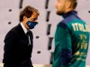 Italy's coach Roberto Mancini walks in a face mask during the international friendly soccer match between Italy and Moldova, at the Artemio Franchi stadium, in Florence, Italy, Wednesday, Oct. 7, 2020. (Marco Bucco/LaPresse via AP)